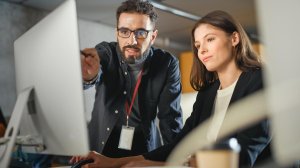 Man and women at computer